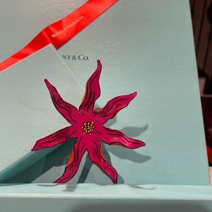 Small flower design by Andy Warhol for the holiday